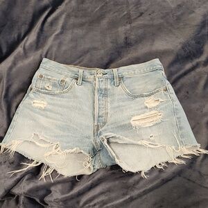 Light wash, button fly, distressed high waist Levi's jean shorts size 30!
